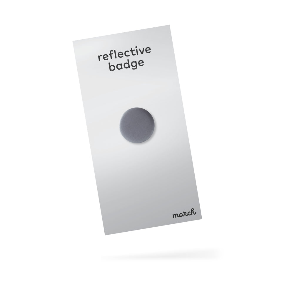 mini reflective badge in silver packaging, width 105 mm and length 210 mm